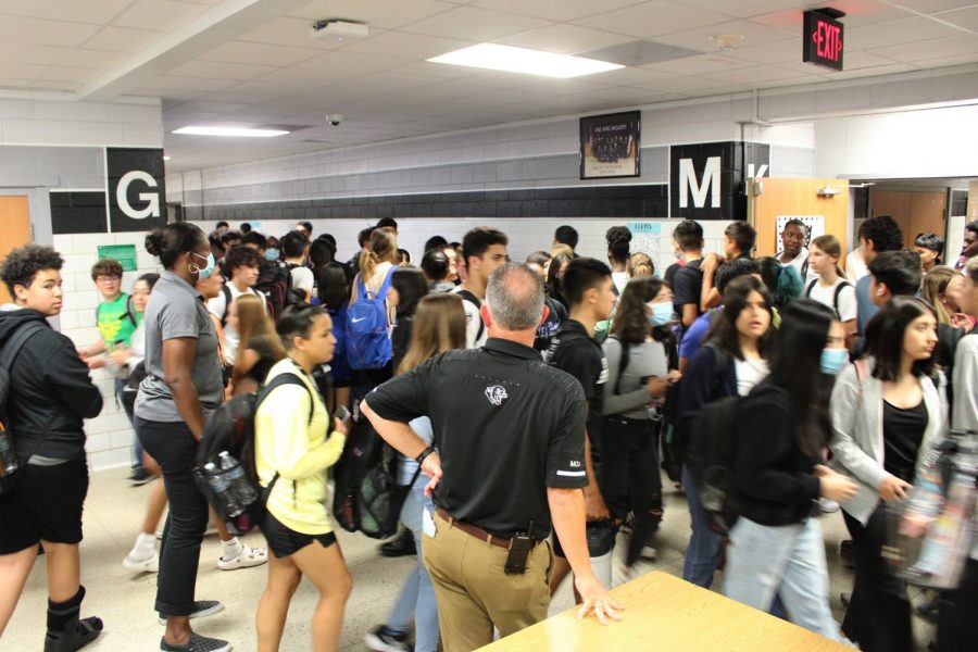 Students crowed in the intersection of M and G hall during passing periods.